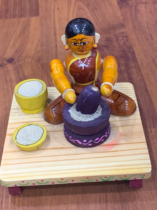 Sitting worker - Grinding batter