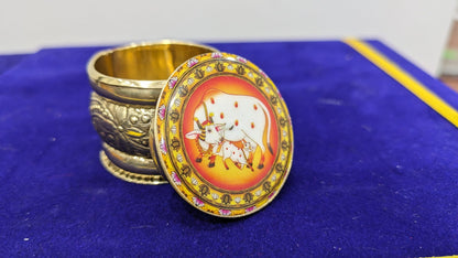 Brass designer kumkum box - Pichwai