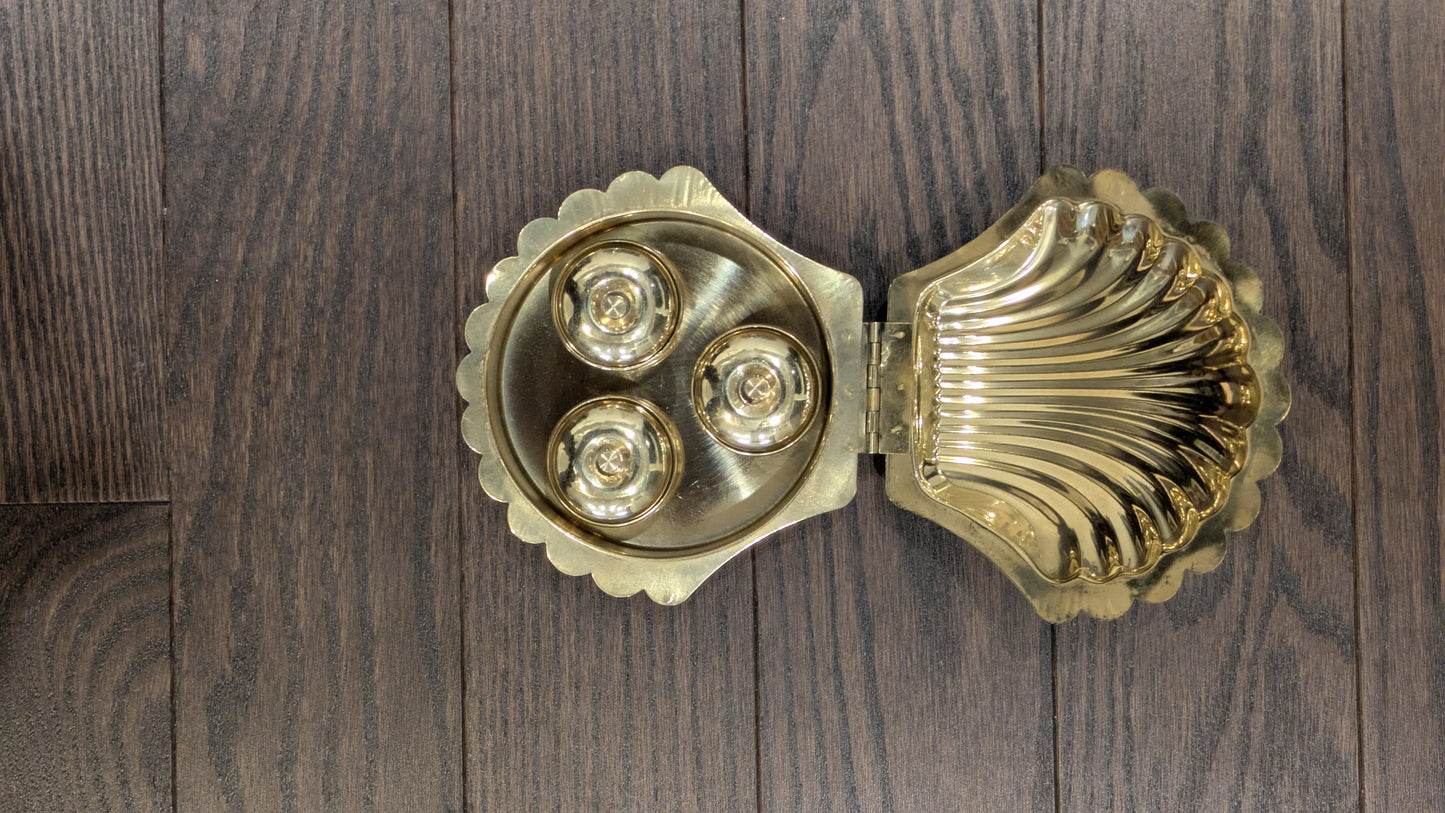 Shell kumkum holder