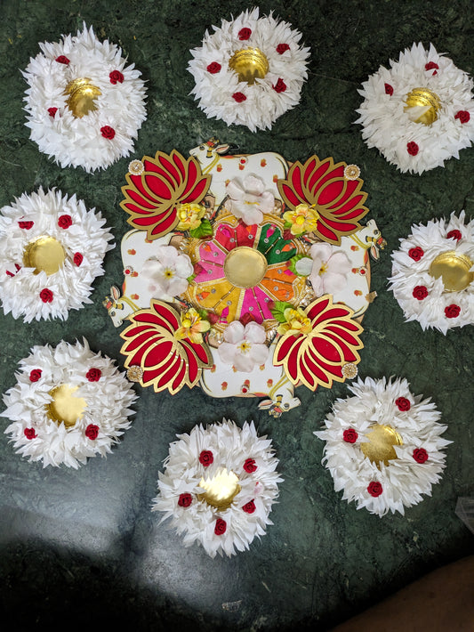 Artificial flower rangoli with Pichwai and Candle holder